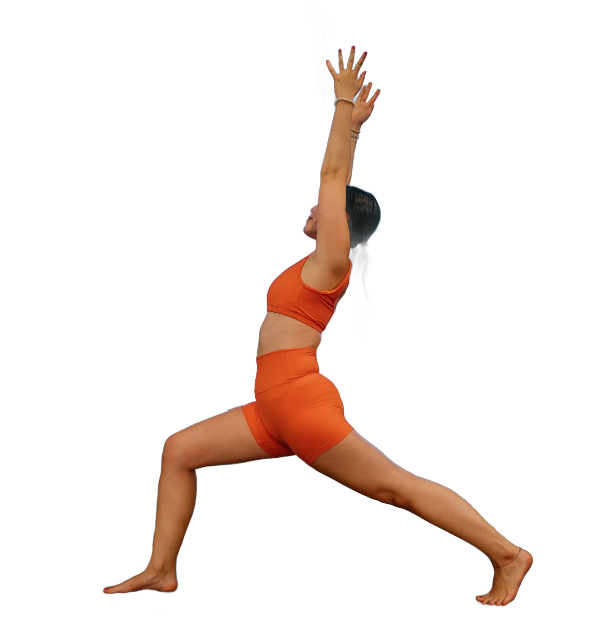 Isabel in a crescent lunge during a professional yoga shoot